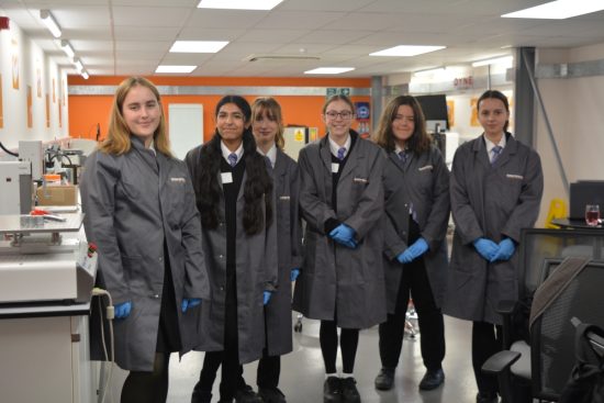 Picture showing the six Gosford Hill students in the Intertronics Technology Centre, about to embark on a practical session
