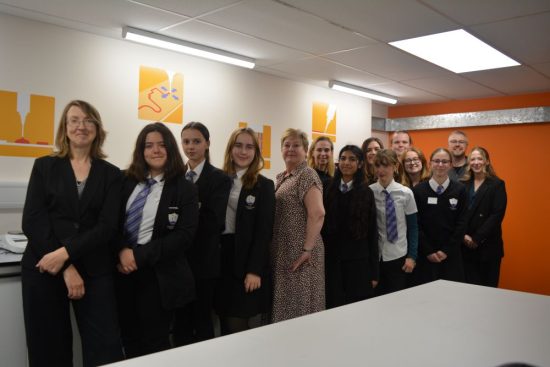 Picture showing Gosford Hill School students, their teacher, and the Intertronics team together in the Technology Centre.
