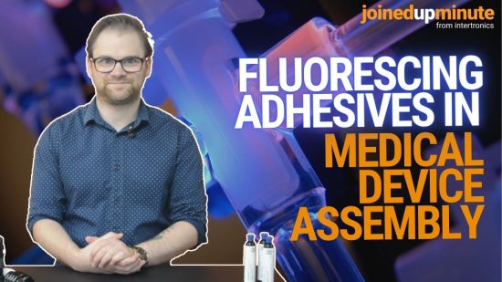 Fluorescing adhesives in medical device assembly