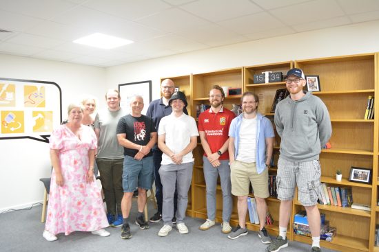 Group photo of the team with Roan