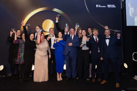 Darren celebrates with all the winners at 2025 UK Coaching Awards.